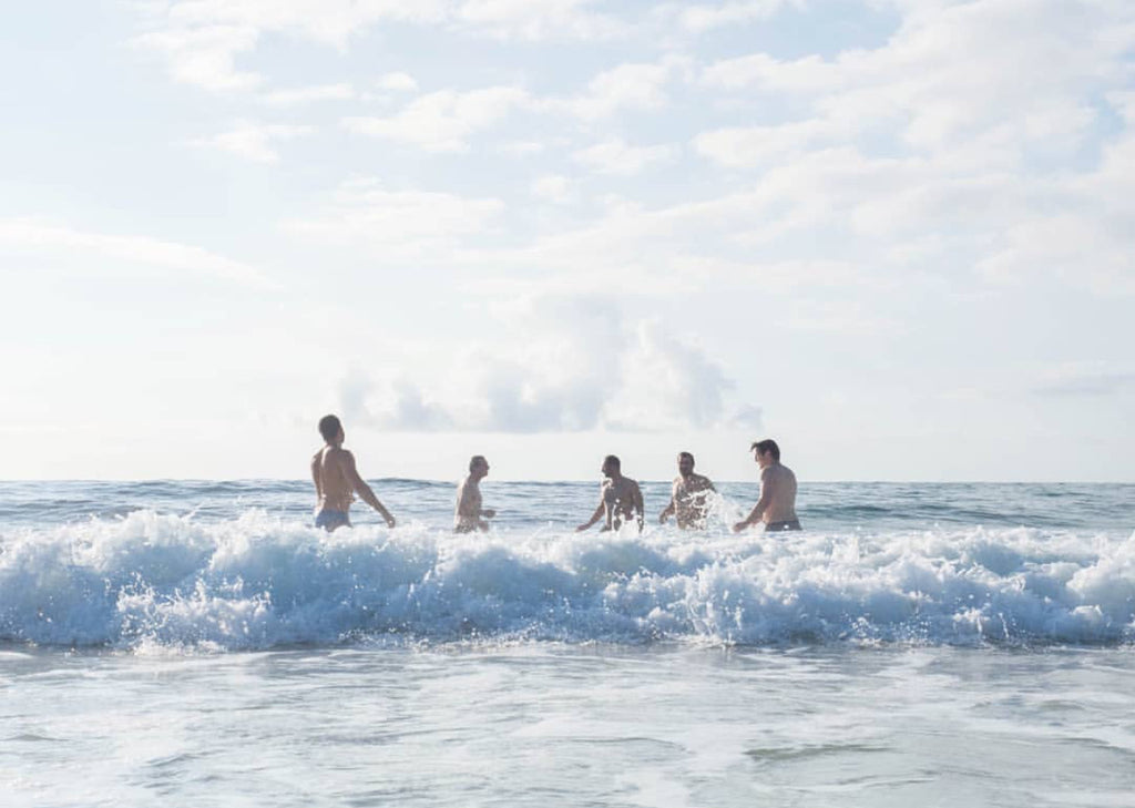 Men's swimwear by Smithers swimwear is a summer necessity. Beach goers enjoying the summer down at Bondi Beach in Sydney in their premium swimwear