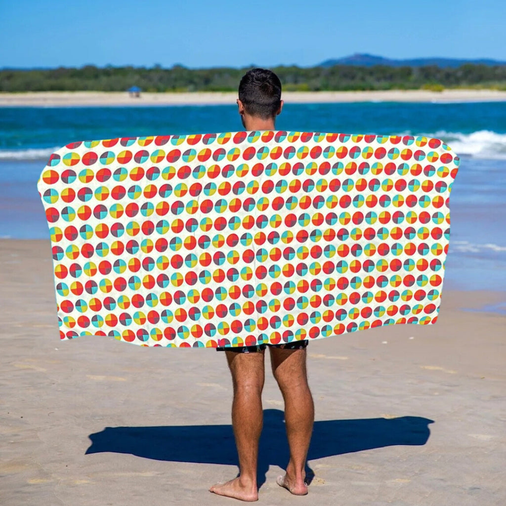 Circles of nostalgie, soft hues, and a very typical palette of the 1970s, the Retro towel from Smithers is an absolute classic.