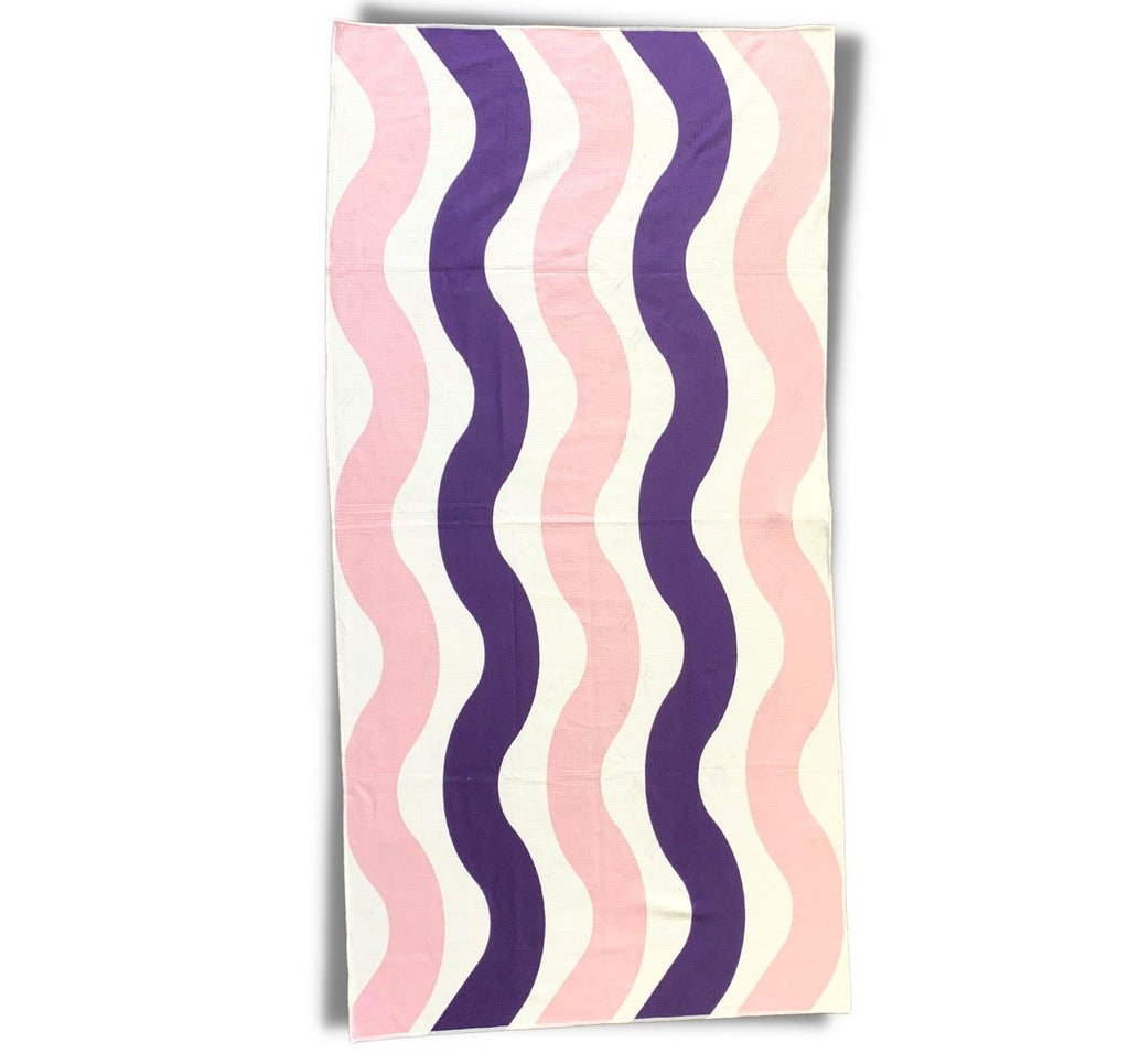 Smithers sand free towel made in Australia from recycled fabrics. Soft wave design features pale pink and navy blue