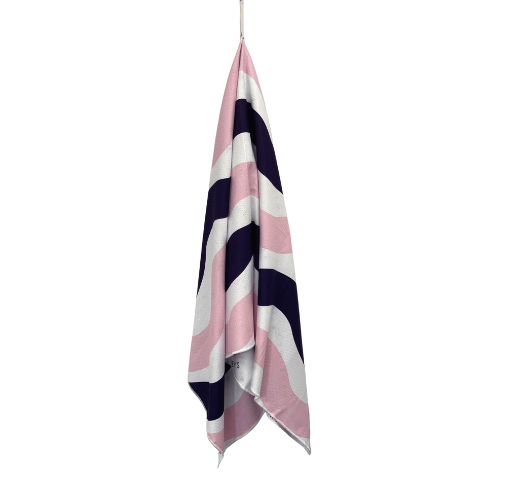 Smithers sand free towel made in Australia from recycled fabrics. Soft wave design features pale pink and navy blue